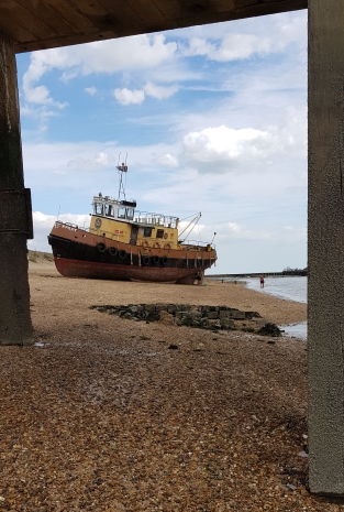 X Pilot from beneath peir